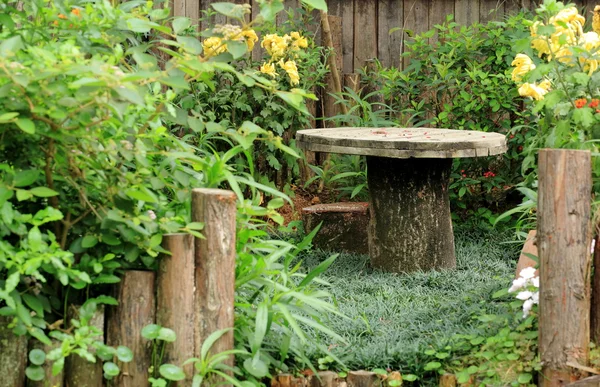 Table in garden — Stock Photo, Image