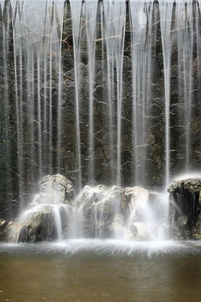 Artificial waterfall background — Stock Image Artificial waterfall background Royalty Free Stock Photos