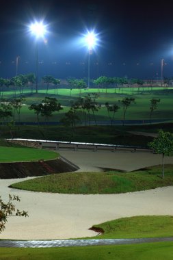 Golf court at night clipart