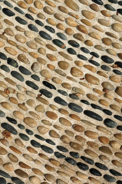 Round pebble stones background — Stock Photo, Image