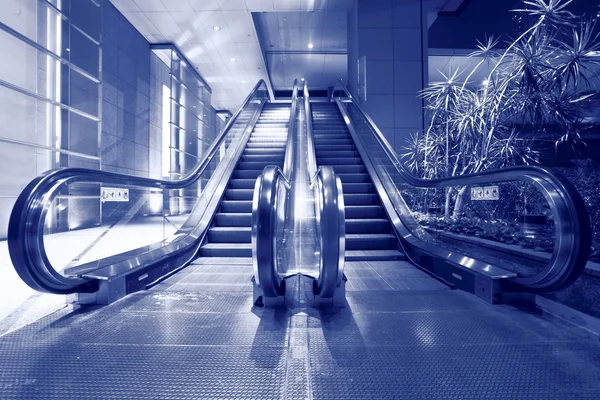 Escalator in blue tone — Stock Photo, Image