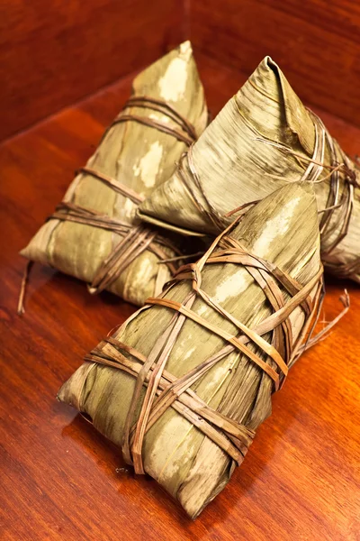 stock image Rice dumplings on wooden background