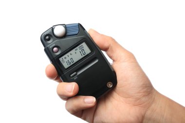 Flash meter use by hand clipart