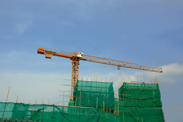 Cranes on construction site — Stock Photo, Image