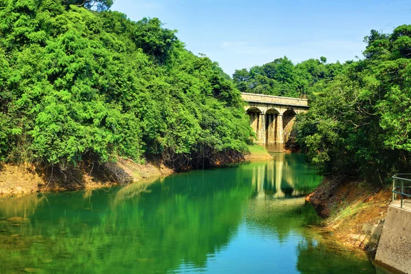 stock image Lake with stone bridge