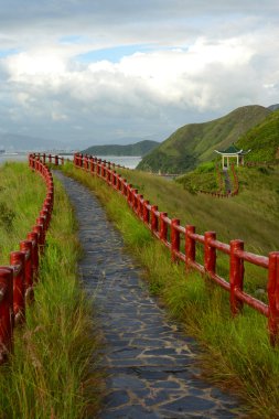 Hiking path with pavillion clipart