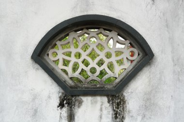 Chinese style window in garden clipart