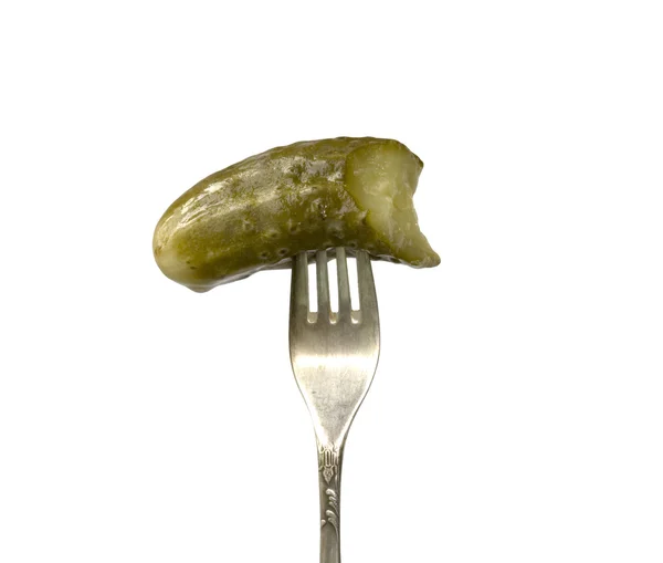 Piece of a pickle on a plug — Stock Photo, Image