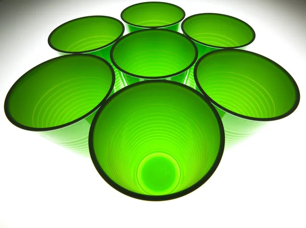 Grüne Plastikbecher Stockfoto