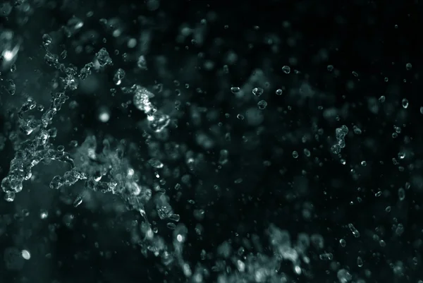 Dark blue water splashes background — Stock Photo, Image