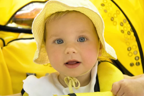 The girl in a yellow hat — Stock Photo, Image