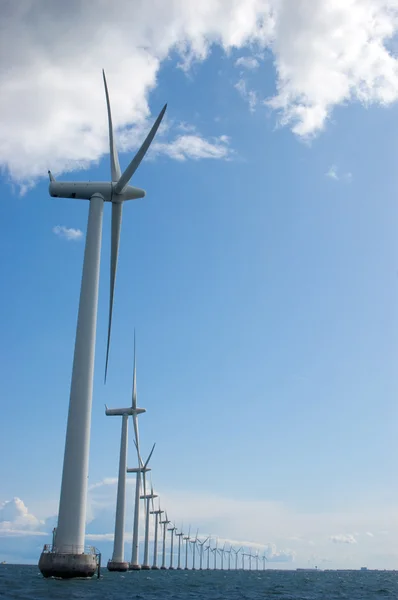 Windmills in a row on sunny weather, vertical — Stock Photo, Image