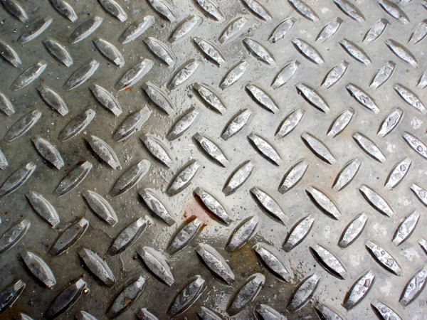 Metal molhado com padrão de cruzamento — Fotografia de Stock