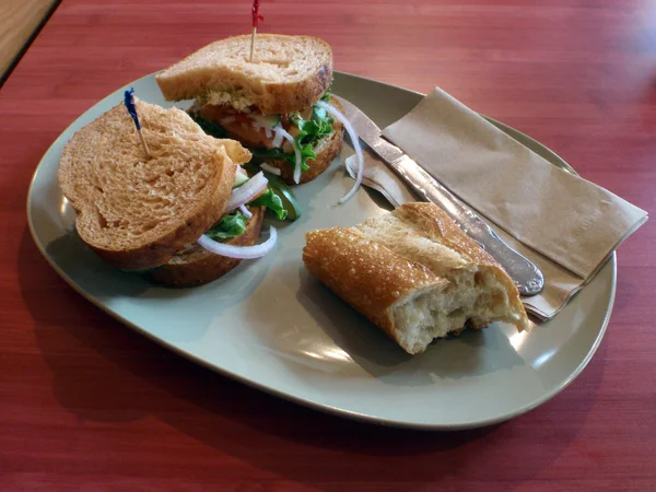 Mediterranean Veggie Sandwich with side of bread — Stock Photo, Image