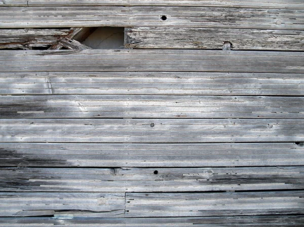 Worns and tattered wood siding — Stock Photo, Image