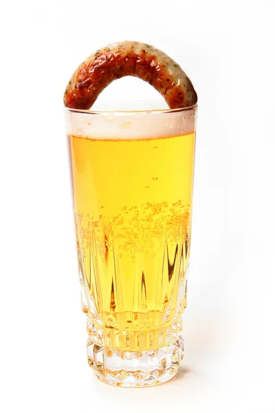 Glass of beer with fried sausage — Stock Photo, Image