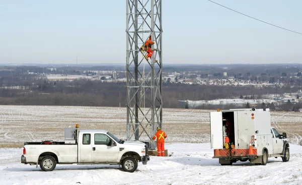Working on a hydro tower — Stock Photo, Image