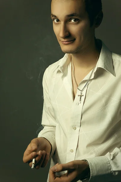 Smiling smoking guy — Stock Photo, Image