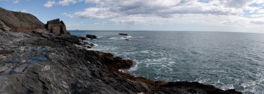 Rocky coast panorama clipart