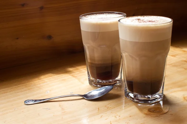 Stock image Two coffees and the spoon