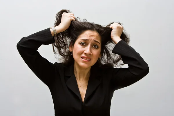 Endişe ve stresli bir iş kadını — Stok fotoğraf