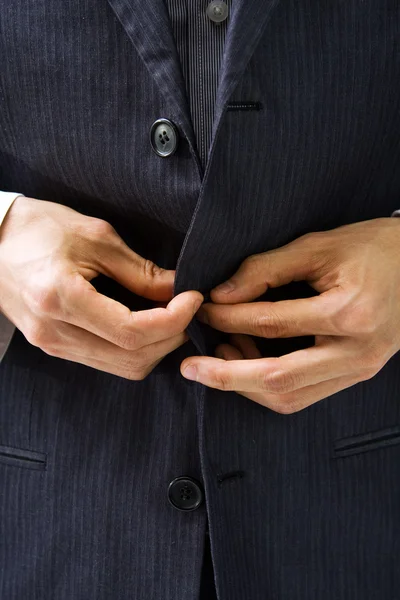Suit and hands — Stock Photo, Image