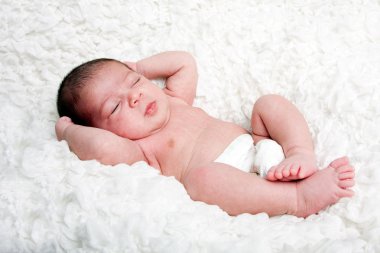 Cute baby asleep on cloud clipart