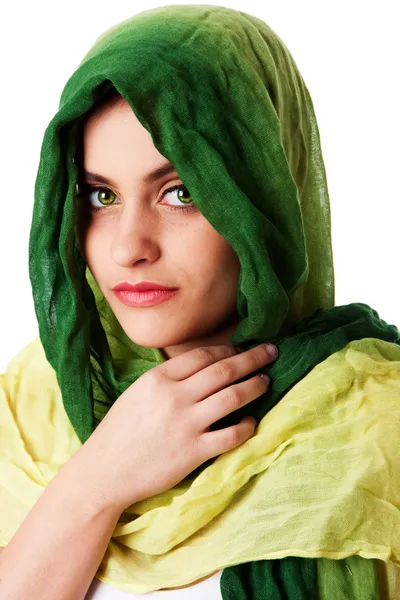 Ansikte med gröna ögon och halsduk — Stockfoto