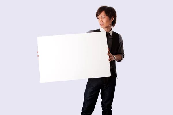 Young business man with white board — Stock Photo, Image