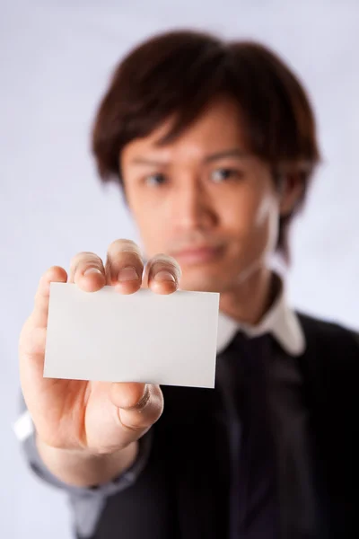 Asian business man with white card — Stock Photo, Image