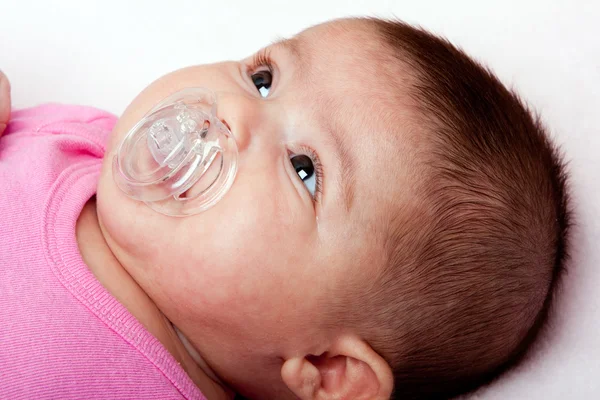 Baby girl with pacifier — Stock Photo, Image