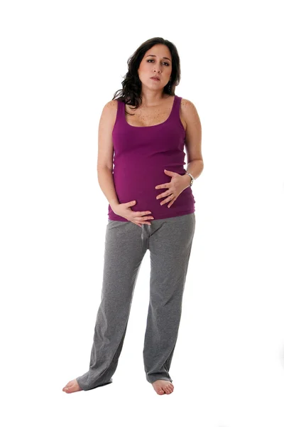 Беременная женщина с болью в животе — стоковое фото