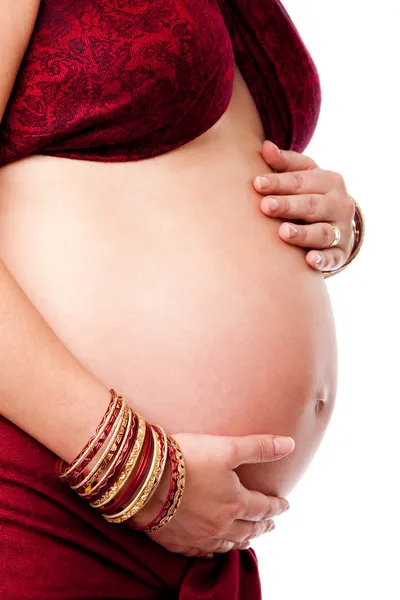 Pregnant woman holding belly — Stock Photo, Image