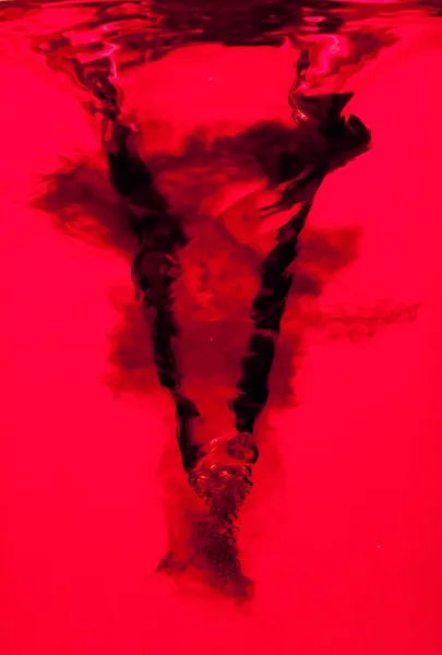 Red water swirl vortex — Stock Photo, Image