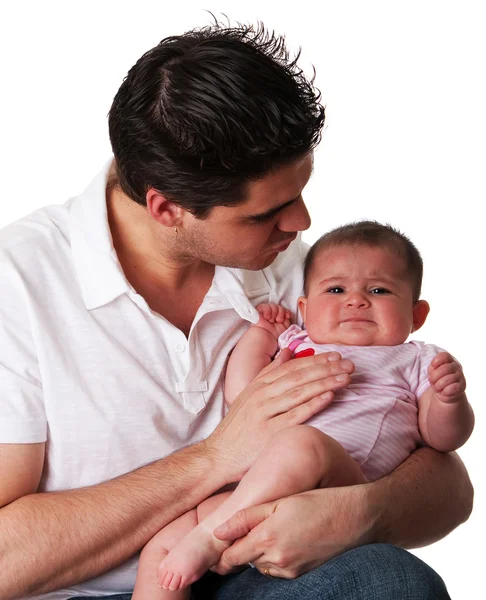 Vader kalmerende ongelukkig baby dochter — Stockfoto