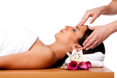 Facial massage in spa clipart