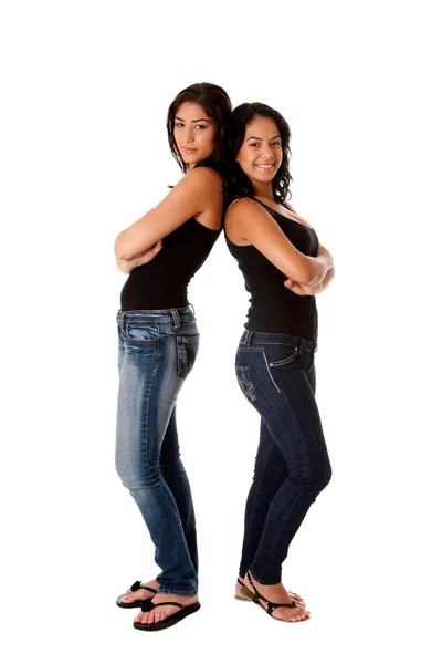 Hppy young girls back to back — Stock Photo, Image
