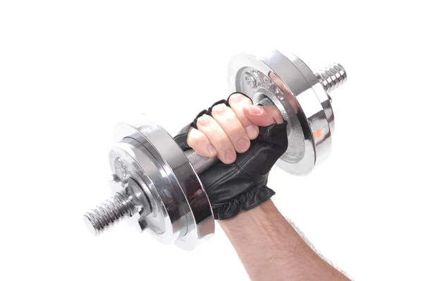 Dumb-bell in a hand — Stock Photo, Image