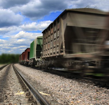 Cargo train speeding clipart