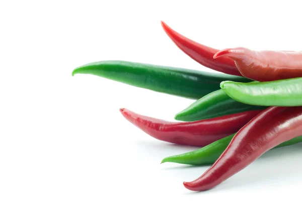 Green and red chili peppers — Stock Photo, Image