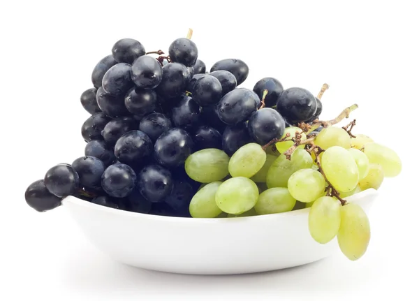 Oddział zielony i czarny winogron — Zdjęcie stockowe