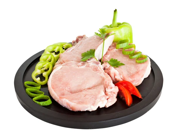 Carne de porco na chapa isolada em branco — Fotografia de Stock
