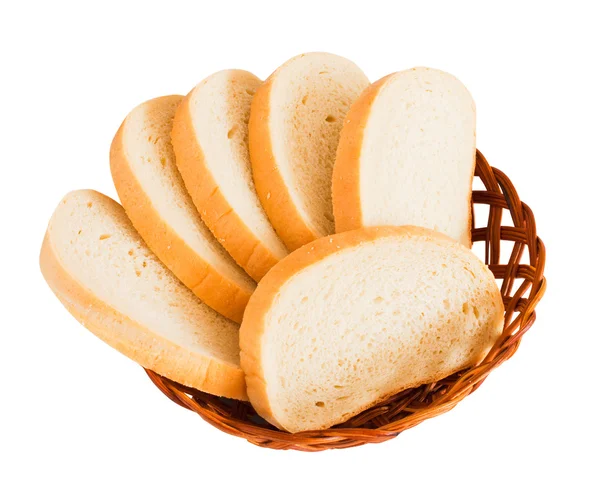 Peu de tranches de pain sur fond blanc — Photo