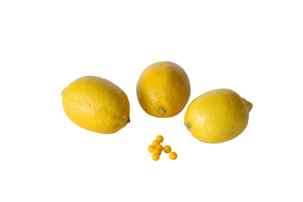 Limões e vitaminas sobre fundo branco — Fotografia de Stock