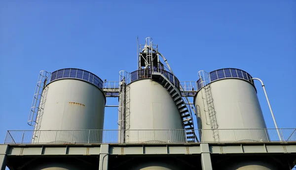 Huge industrial reservoir barrels — Stockfoto