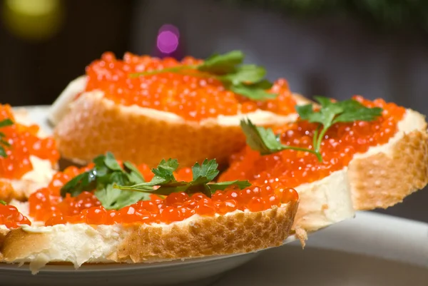 Sandwiches with red caviar. — Stock Photo, Image