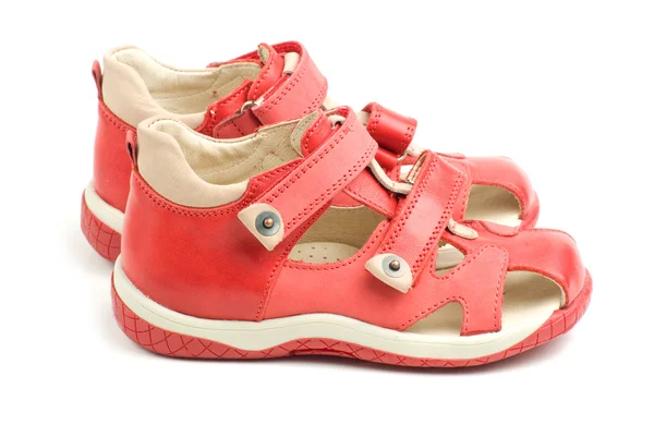 Mały czerwony dzieci buty. — Zdjęcie stockowe