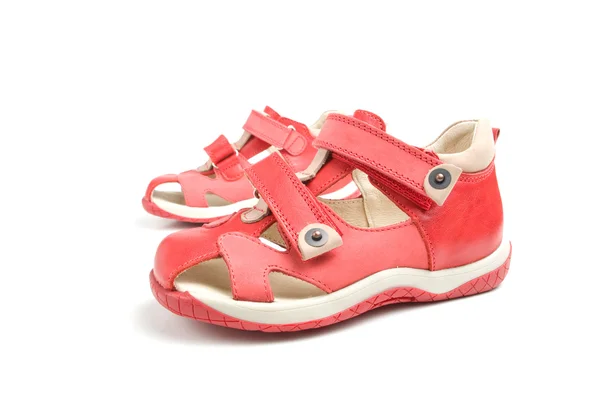 Malé červené dětské boty. — Stock fotografie