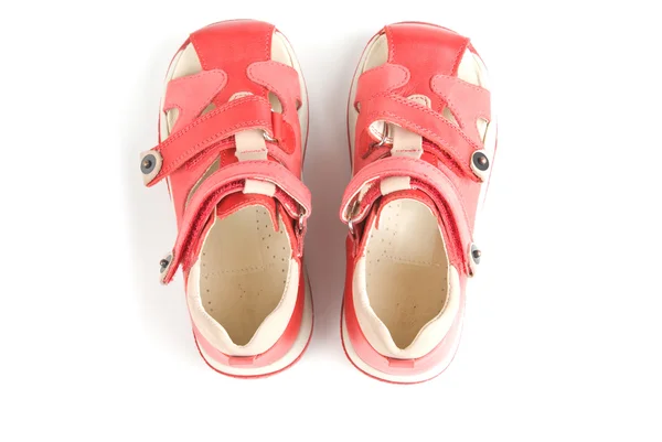 Malé červené dětské boty. — Stock fotografie