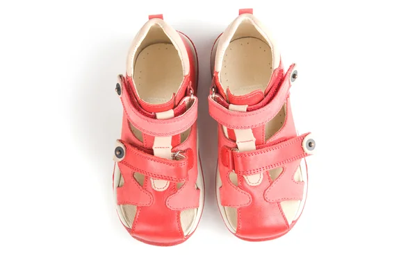 Kis piros gyerek cipő. — Stock Fotó